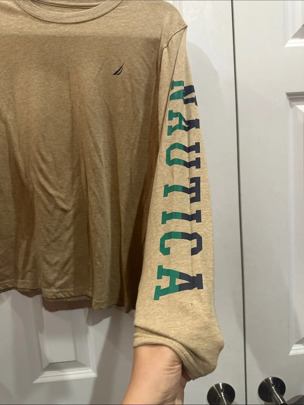 NWOT Kids Nautica Tan Long Sleeve Shirt with Green Sleeve Lettering size 14/16